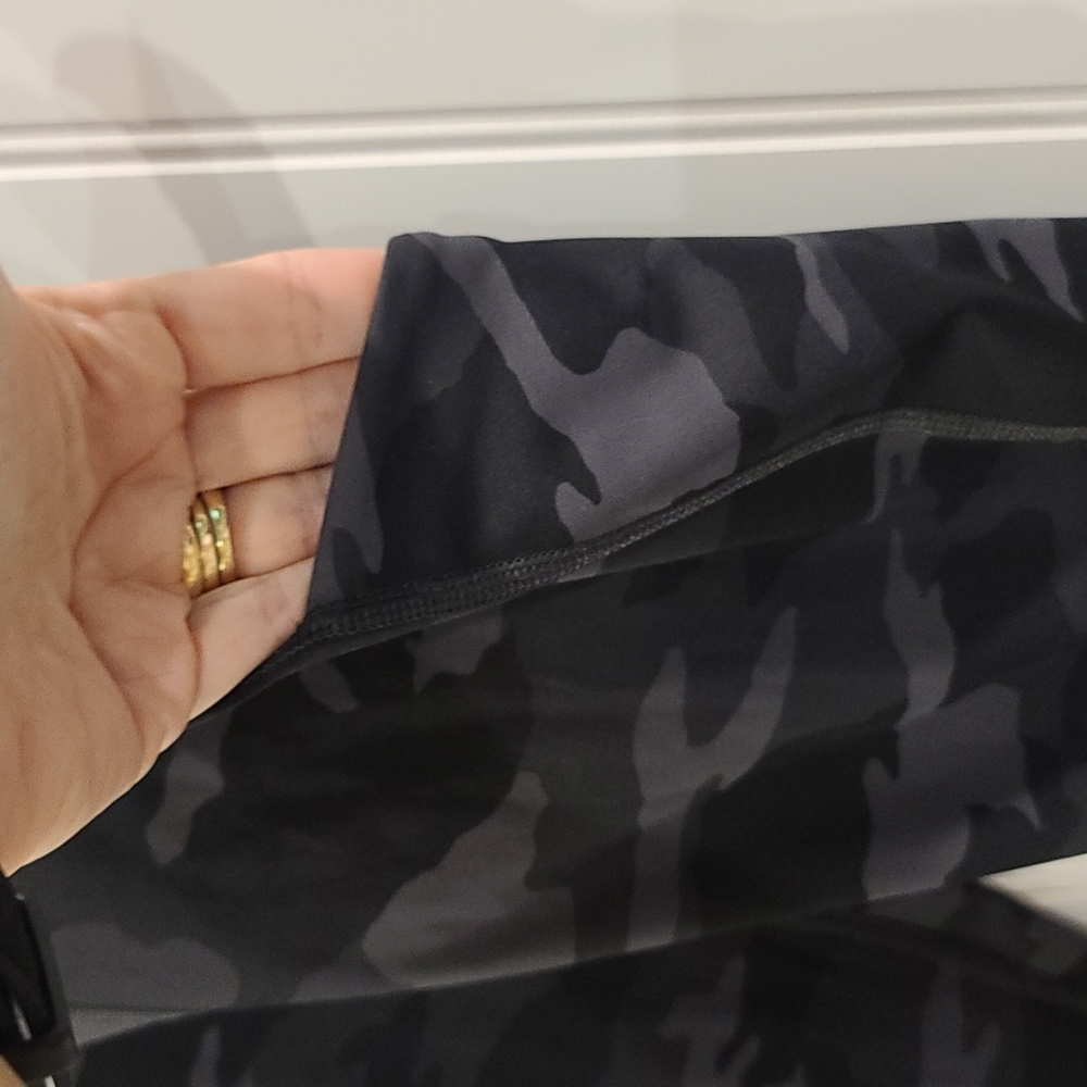 Practically brand new!  Athleta Ultimate 7/8 tights in black camo print. Size XS - Picture 6 of 9
